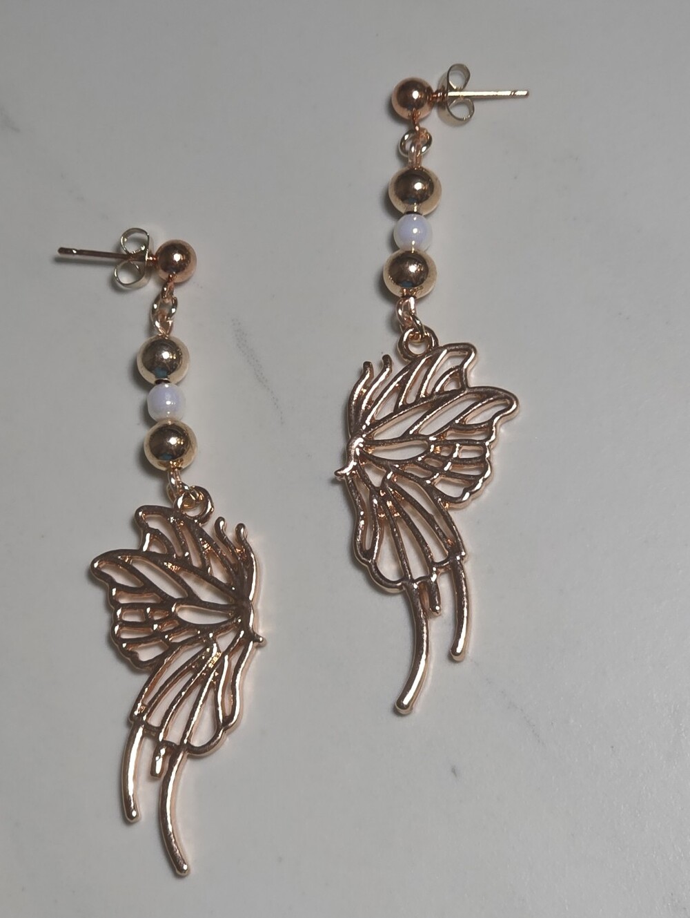 Rose Gold Butterfly Wing Drop Earrings - Hypoallergenic Posts - Picture 3 of 4